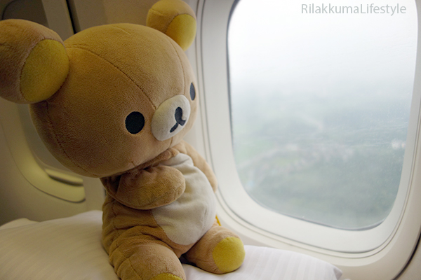 Rilakkuma on Airplane - window view
